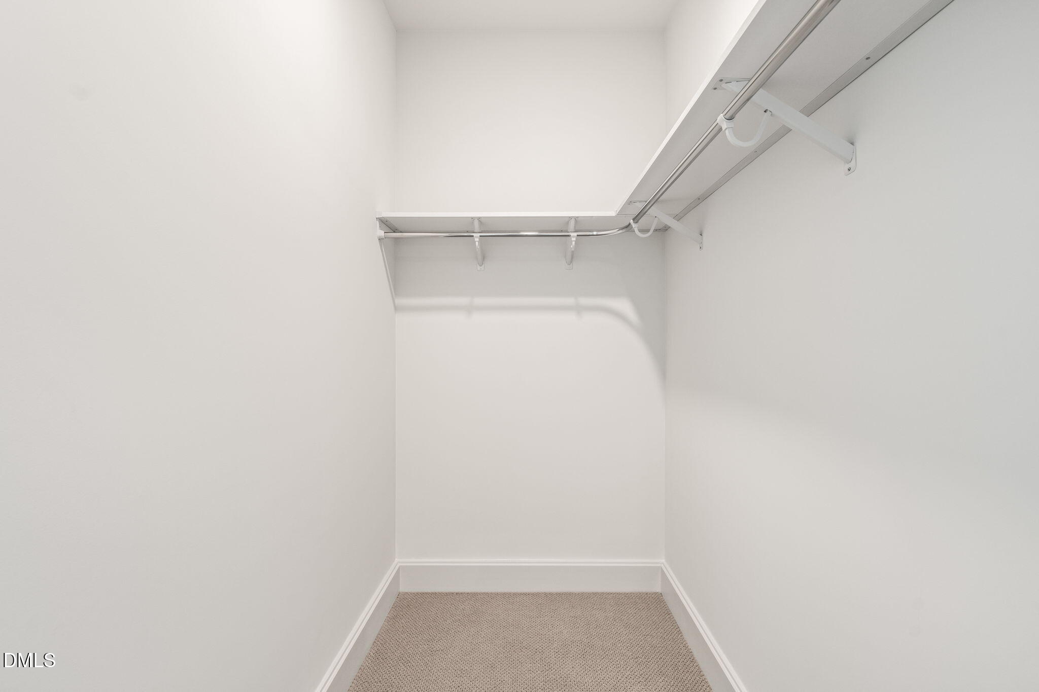 115 Morris Street, Unit 2501 Durham, NC 27701 - Photo 35 of 76 a view of walk in closet with empty racks