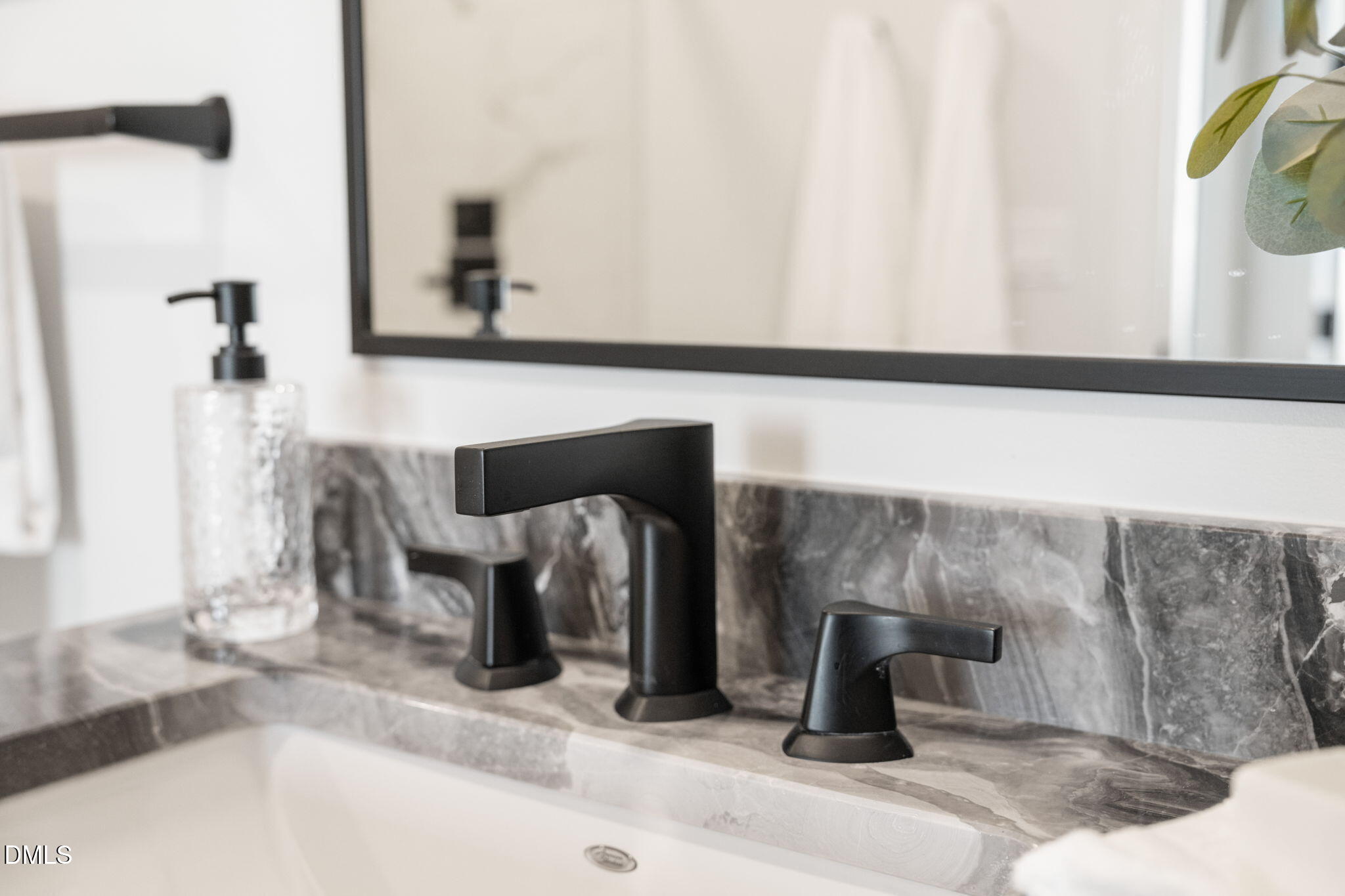 115 Morris Street, Unit 2501 Durham, NC 27701 - Photo 45 of 76 a close view of a sink and a fireplace in a bathroom