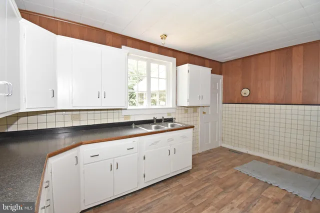 a view of a utility room with a door