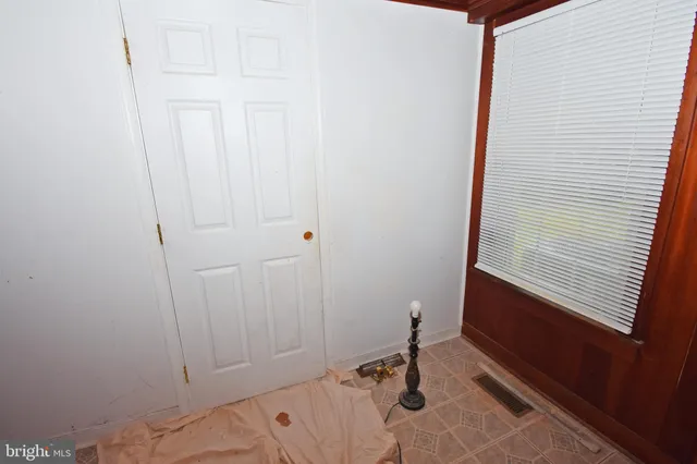 an empty room with window