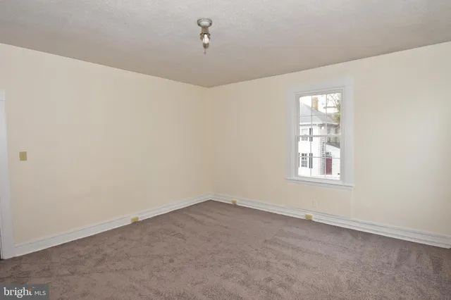 a view of a room with a window