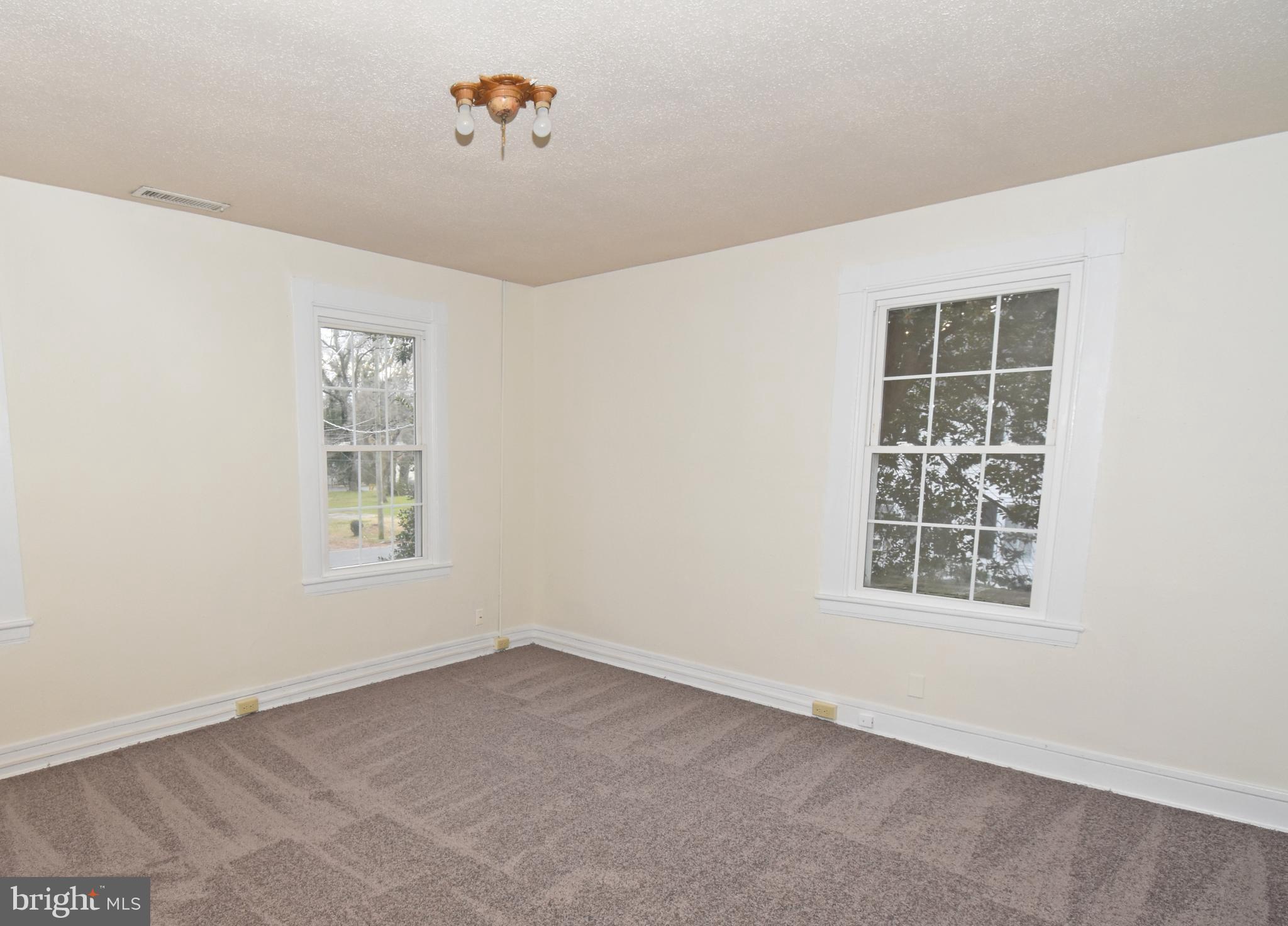 30472 Broad Street Princess Anne, MD 21853 - Photo 29 of 74 an empty room with a window