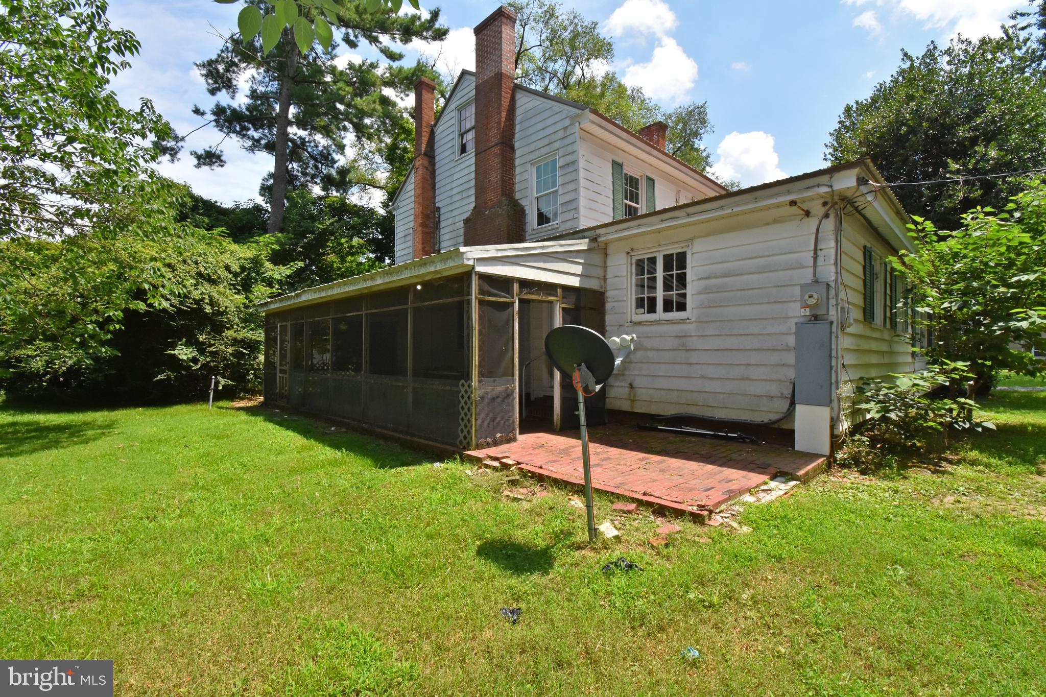 30472 Broad Street Princess Anne, MD 21853 - Photo 41 of 74 a view of a house with backyard and garden