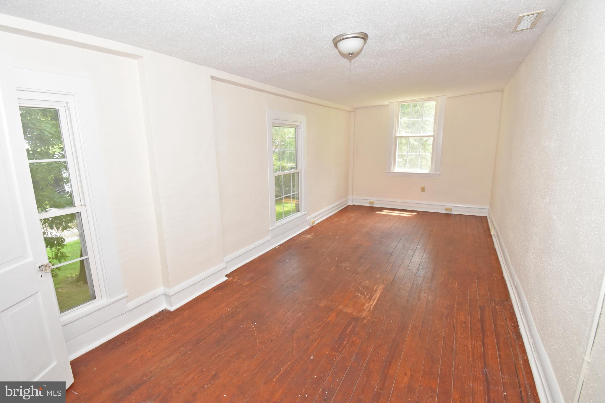 30472 Broad Street Princess Anne, MD 21853 - Photo 72 of 74 an empty room with windows