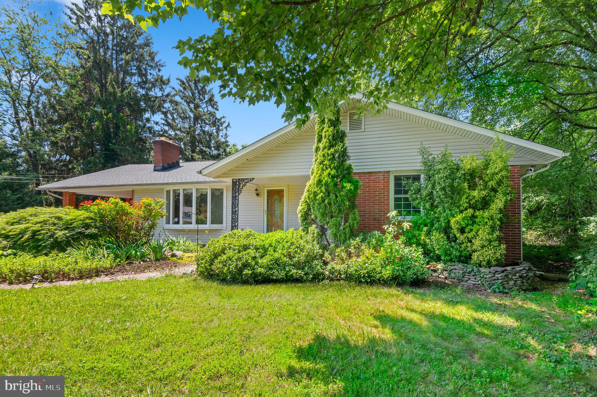 312 Whitaker Mill Road Fallston, MD 21047 - Photo 2 of 57 a front view of a house with a yard