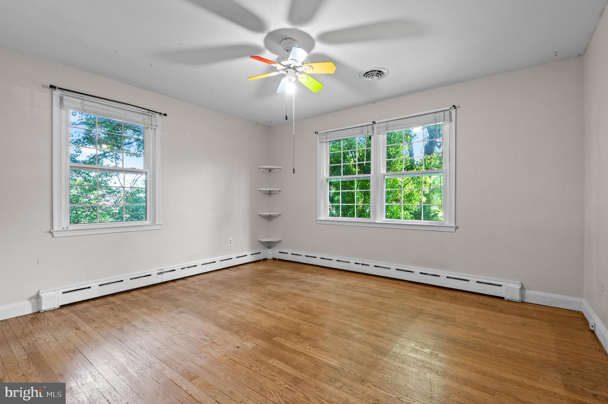 312 Whitaker Mill Road Fallston, MD 21047 - Photo 26 of 57 a view of an empty room with a window and wooden floor