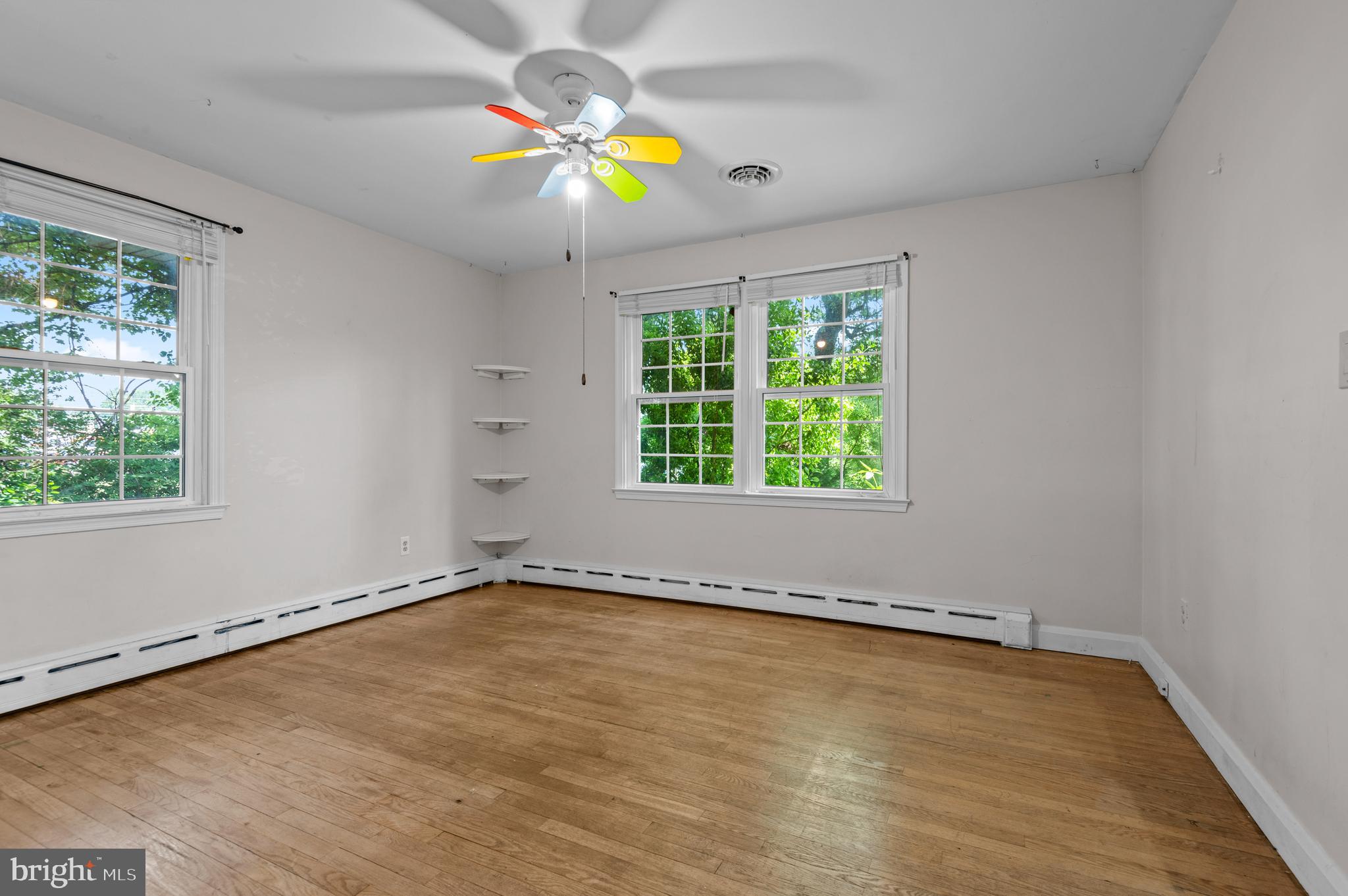 312 Whitaker Mill Road Fallston, MD 21047 - Photo 27 of 57 wooden floor in an empty room with a window