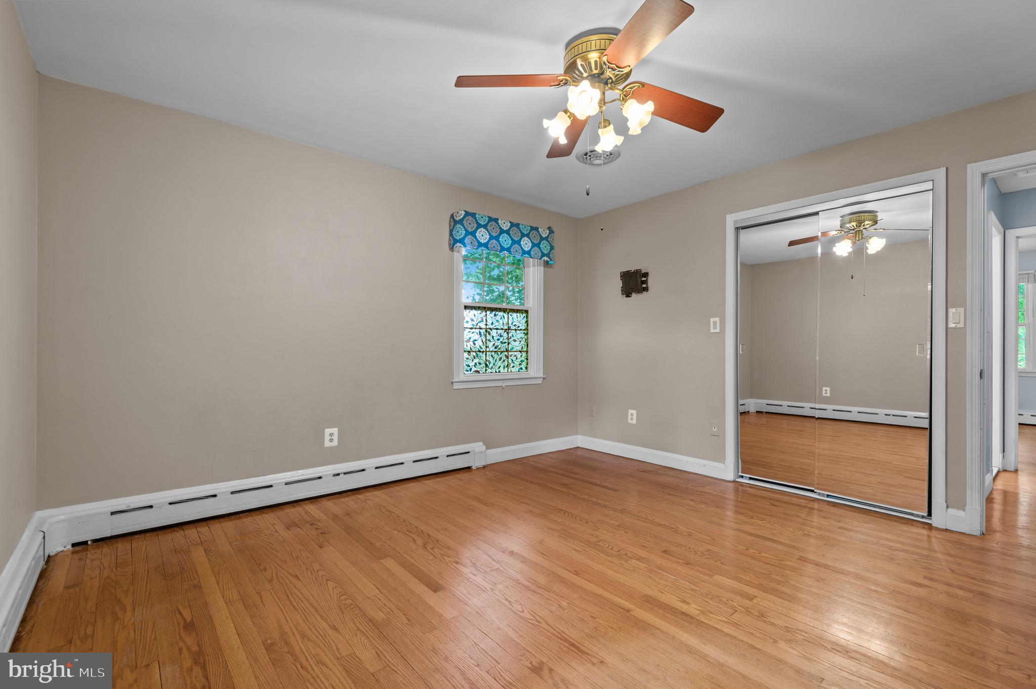 312 Whitaker Mill Road Fallston, MD 21047 - Photo 32 of 57 wooden floor in an empty room with a window