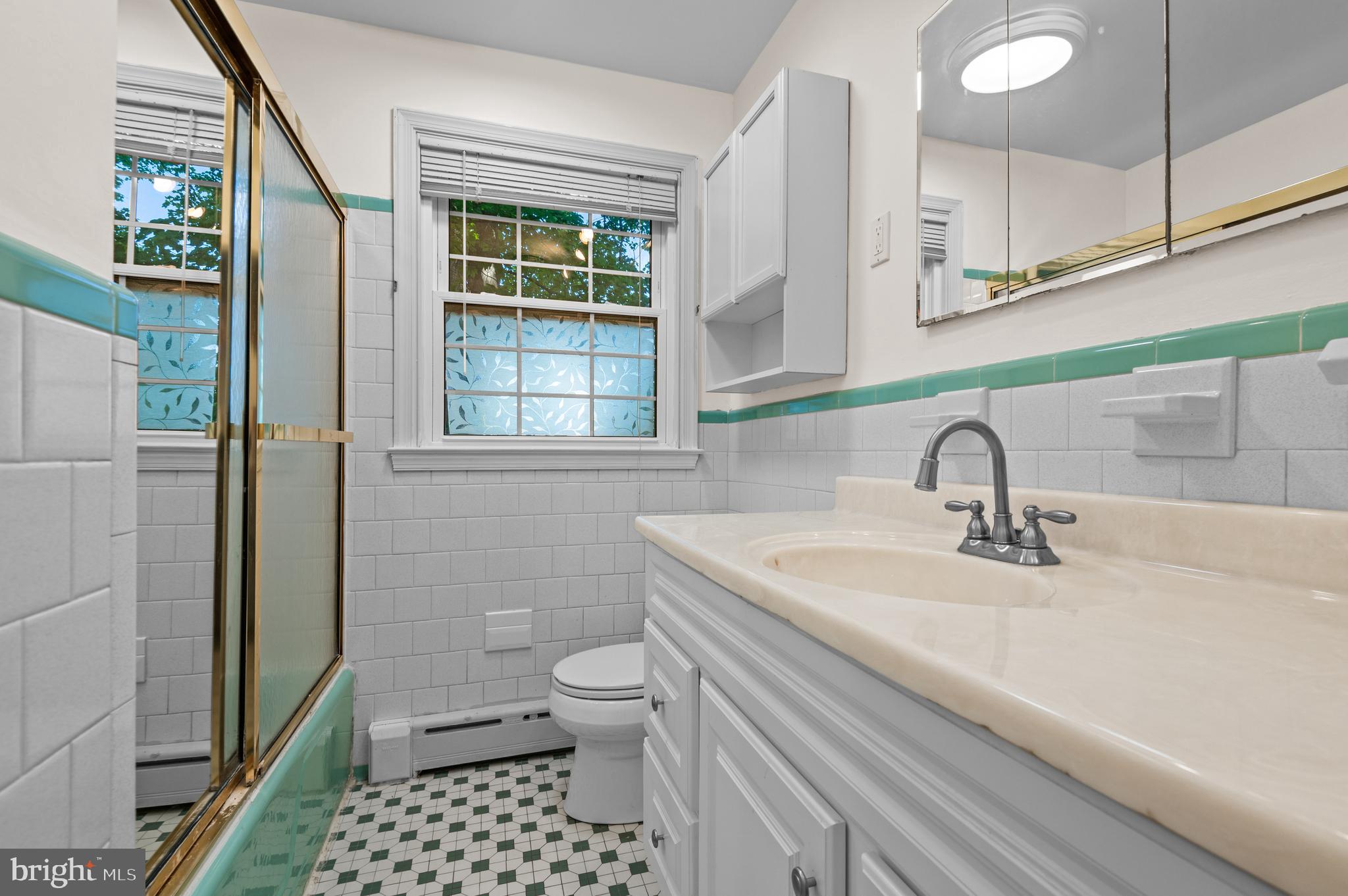 312 Whitaker Mill Road Fallston, MD 21047 - Photo 33 of 57 a bathroom with a sink a toilet and a shower