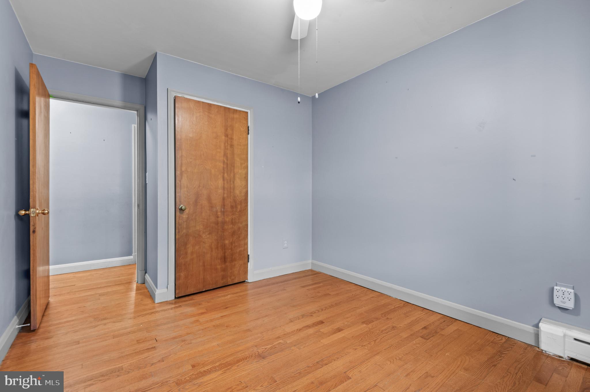 312 Whitaker Mill Road Fallston, MD 21047 - Photo 35 of 57 an empty room with wooden floor and windows