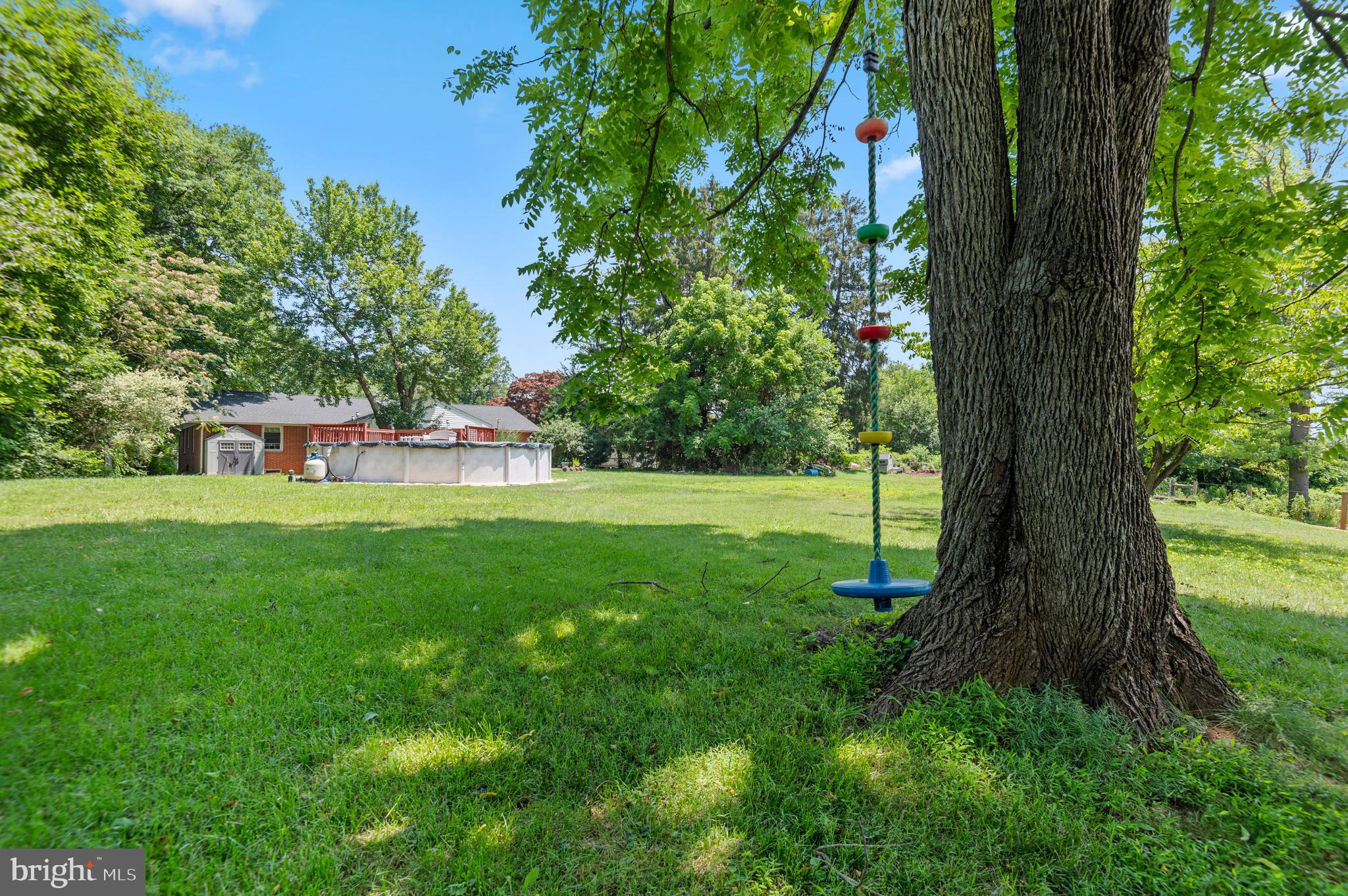 312 Whitaker Mill Road Fallston, MD 21047 - Photo 46 of 57 a view of green field with a tree in the background