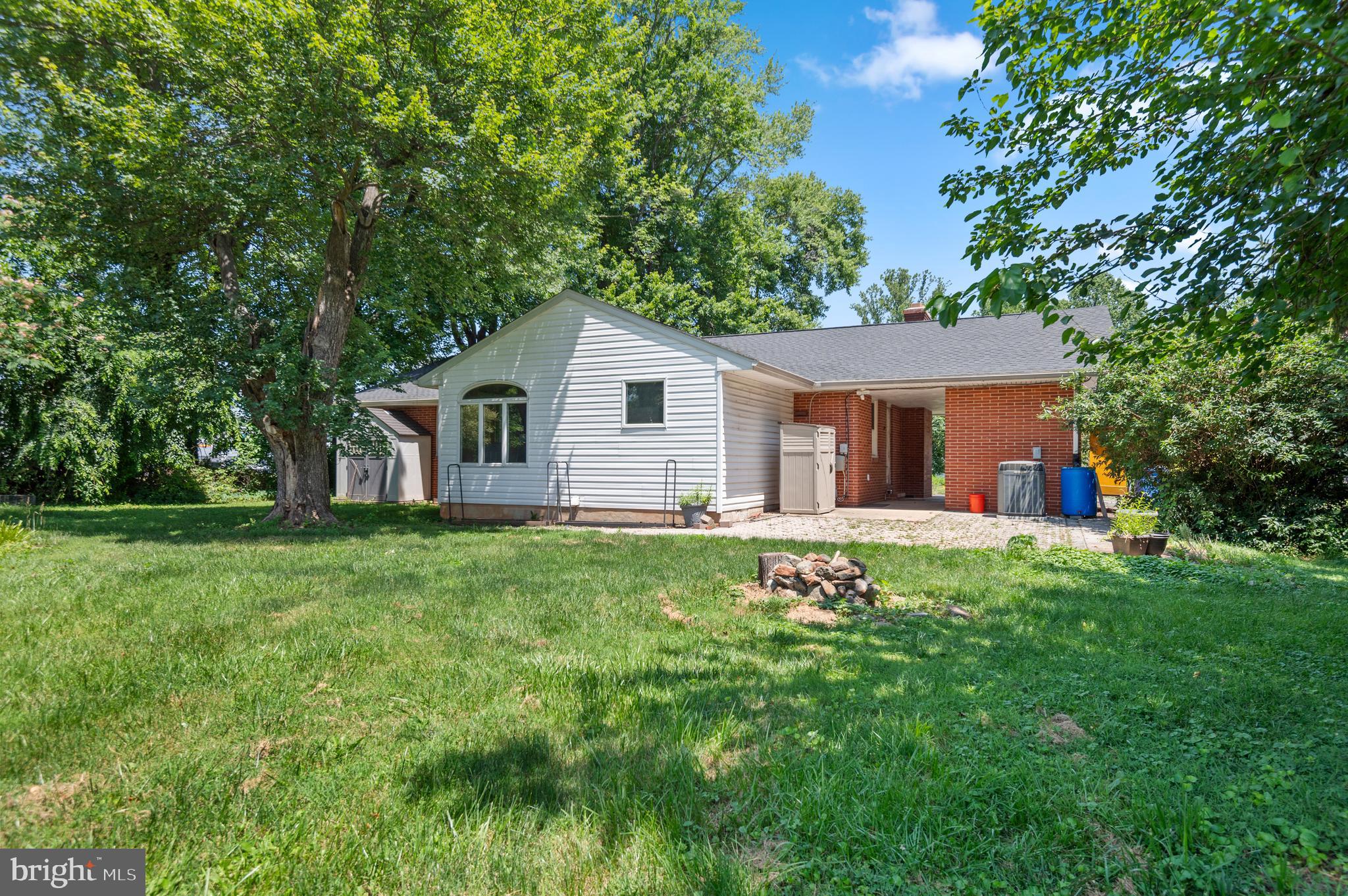 312 Whitaker Mill Road Fallston, MD 21047 - Photo 47 of 57 a view of a house with a big yard potted plants and large tree