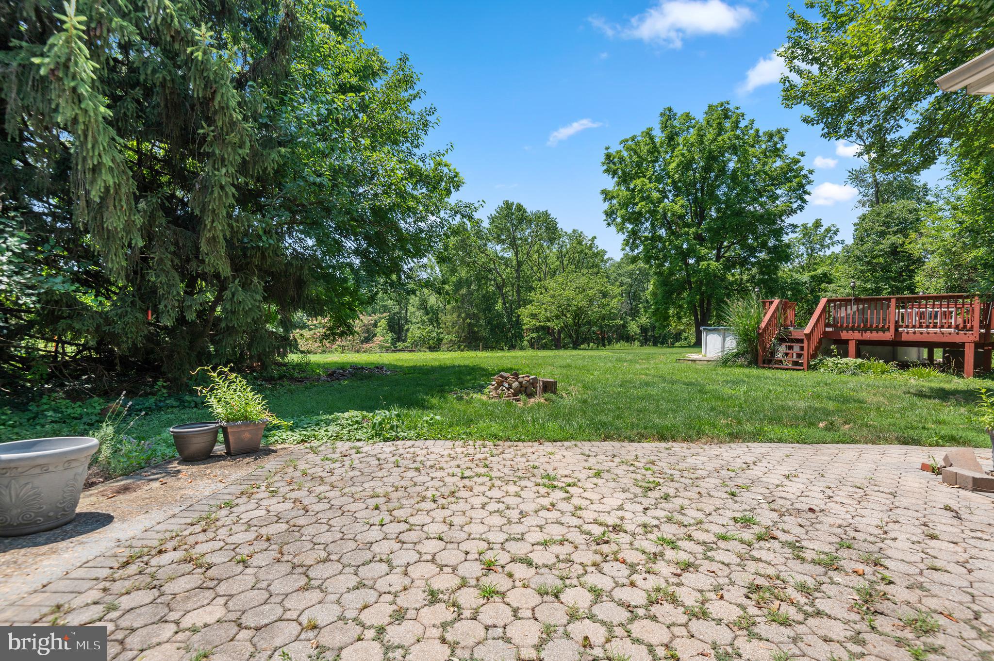 312 Whitaker Mill Road Fallston, MD 21047 - Photo 49 of 57 a view of a garden with a bench