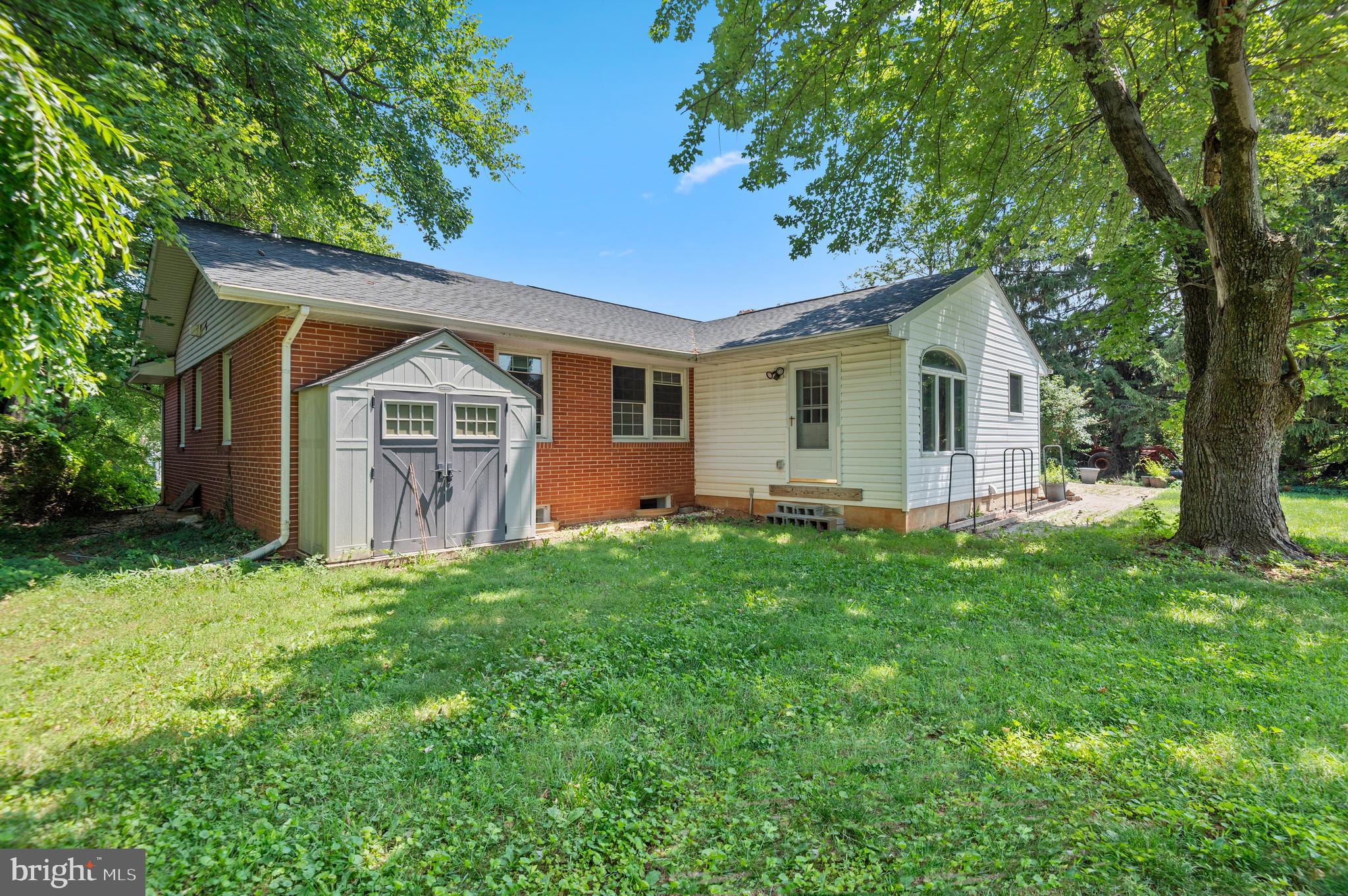 312 Whitaker Mill Road Fallston, MD 21047 - Photo 57 of 57 a view of a yard in front of a house with large tree