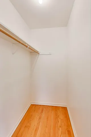 a view of a room with shelf on the wall