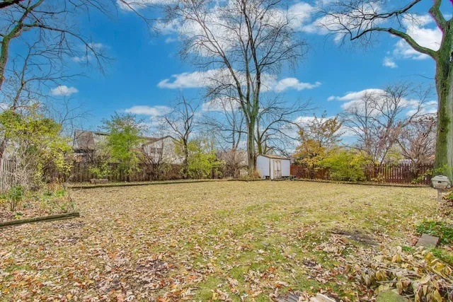 a view of big yard with an outdoor space