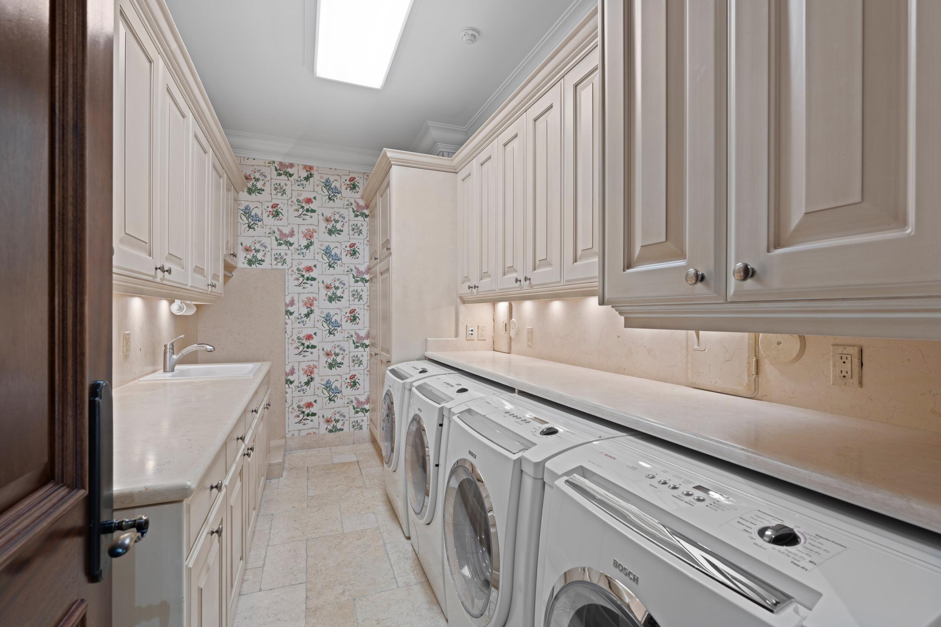 166 Alexander Palm Road Boca Raton, FL 33432 - Photo 102 of 122 a view of washer and dryer