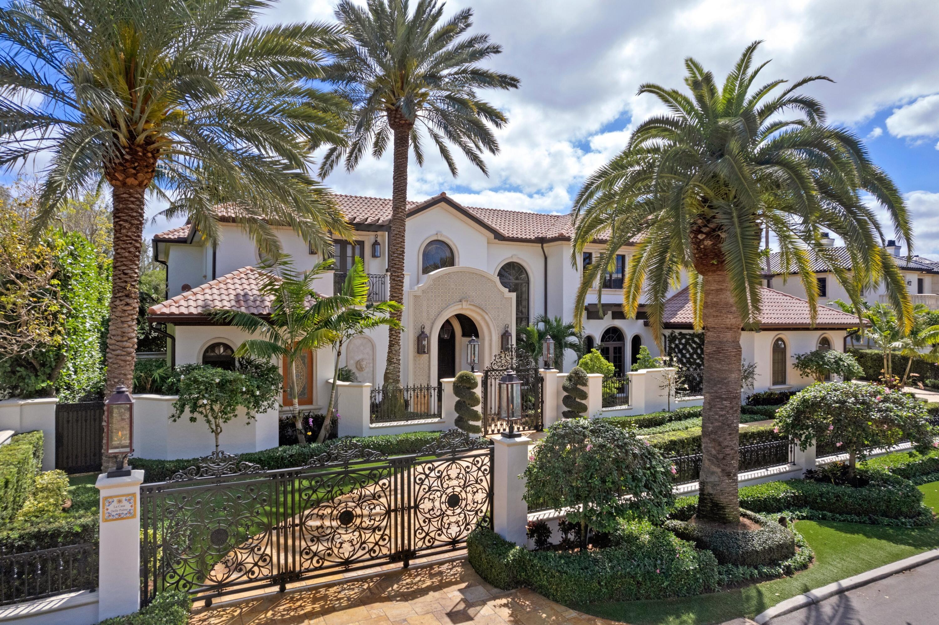 166 Alexander Palm Road Boca Raton, FL 33432 - Photo 2 of 122 a front view of a house with garden
