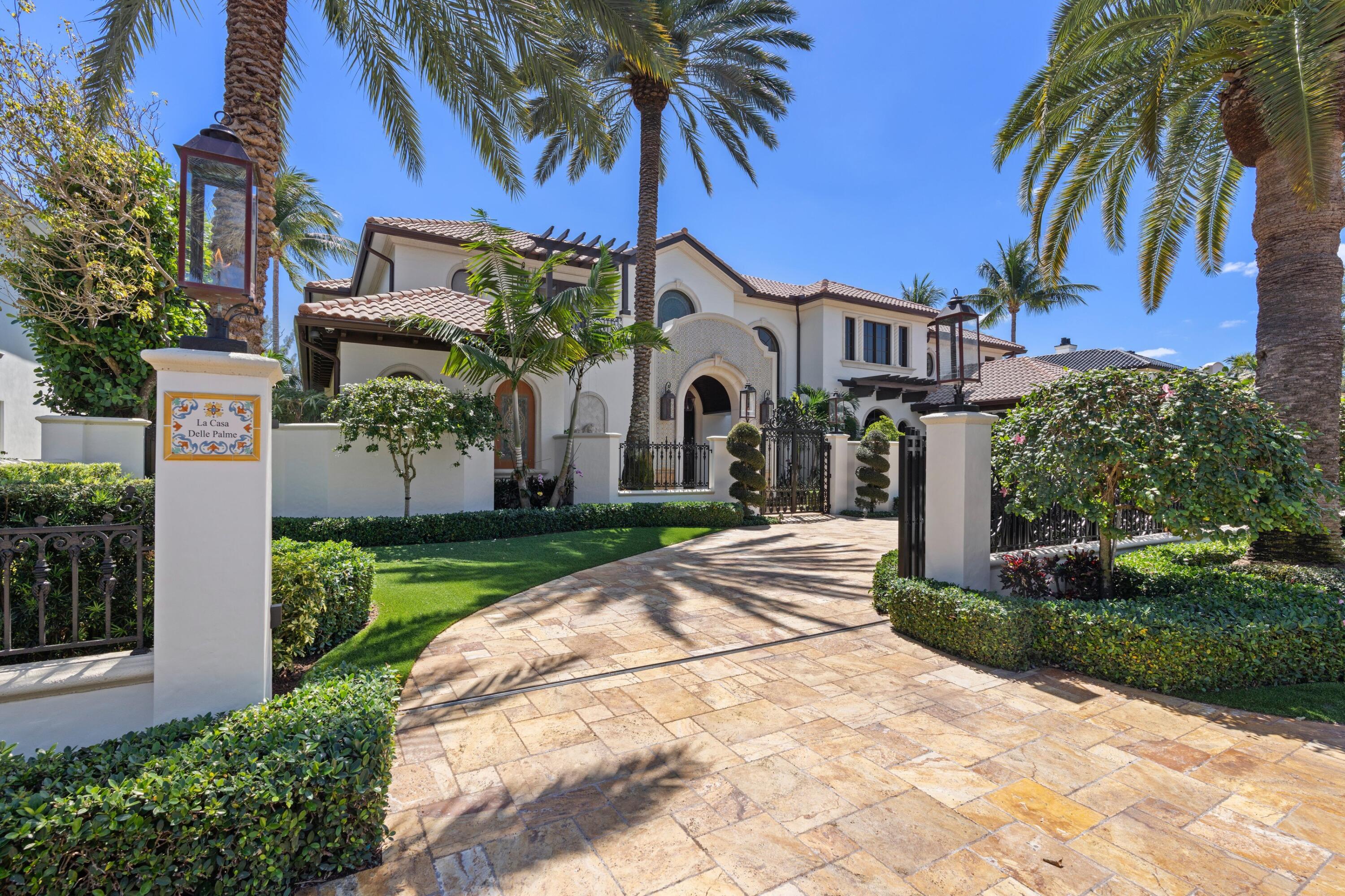 166 Alexander Palm Road Boca Raton, FL 33432 - Photo 3 of 122 a front view of a house with garden