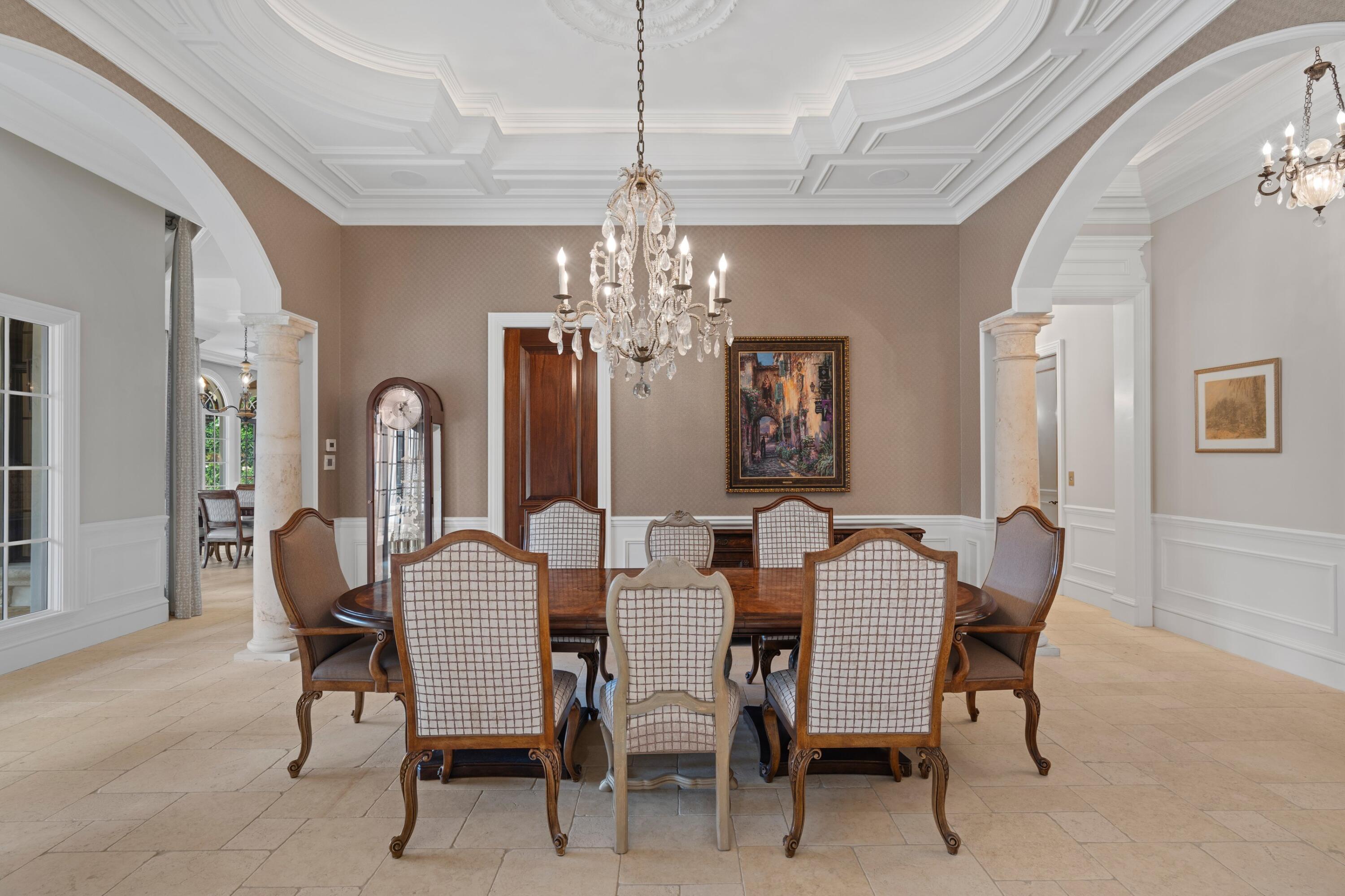 166 Alexander Palm Road Boca Raton, FL 33432 - Photo 35 of 122 a view of a dining room with furniture and chandelier