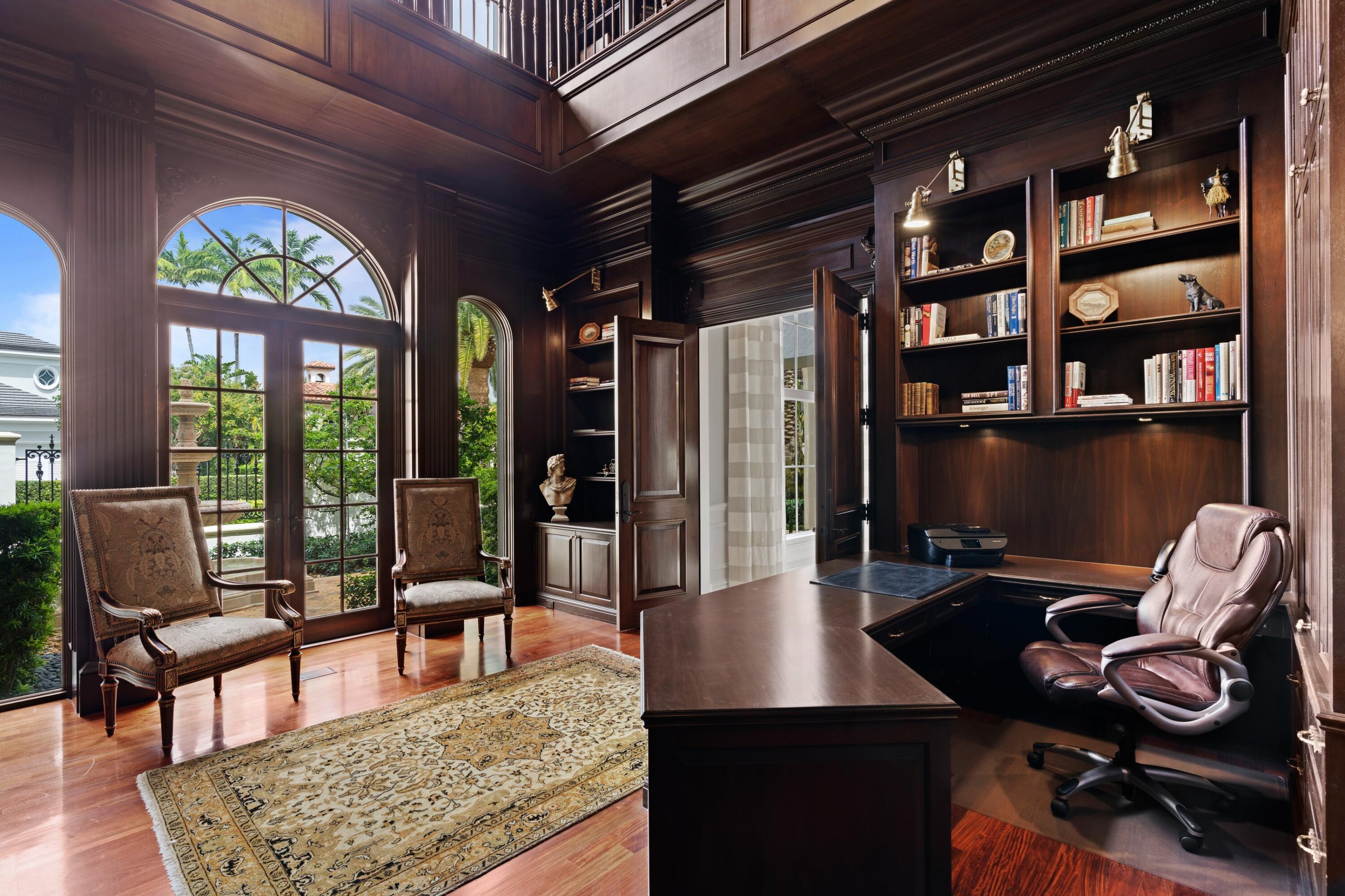 166 Alexander Palm Road Boca Raton, FL 33432 - Photo 69 of 122 a living room with furniture a rug and a floor to ceiling window