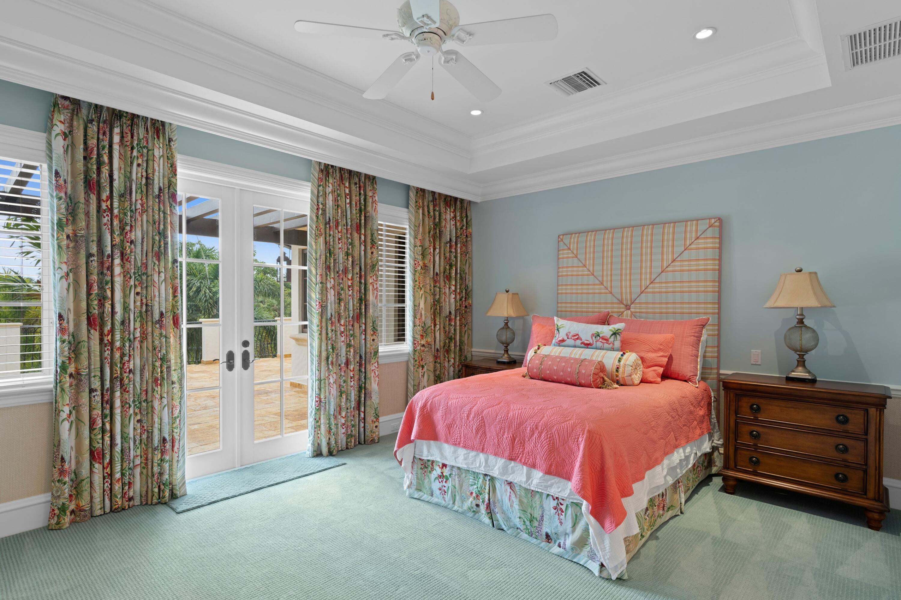 166 Alexander Palm Road Boca Raton, FL 33432 - Photo 86 of 122 a bedroom with a bed and a cabinets