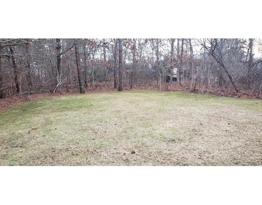 29 Walton Road Harwich, MA 02645 - Photo 19 of 23 a view of a backyard with wooden fence