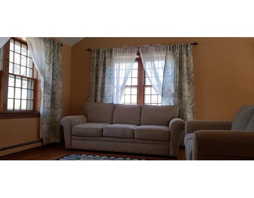 29 Walton Road Harwich, MA 02645 - Photo 2 of 23 a living room with furniture and a window