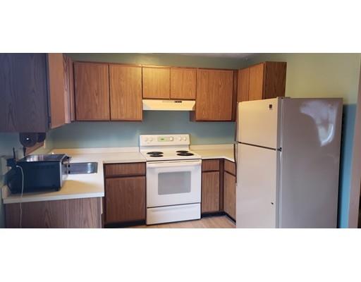 29 Walton Road Harwich, MA 02645 - Photo 6 of 23 a kitchen with a refrigerator sink and cabinets