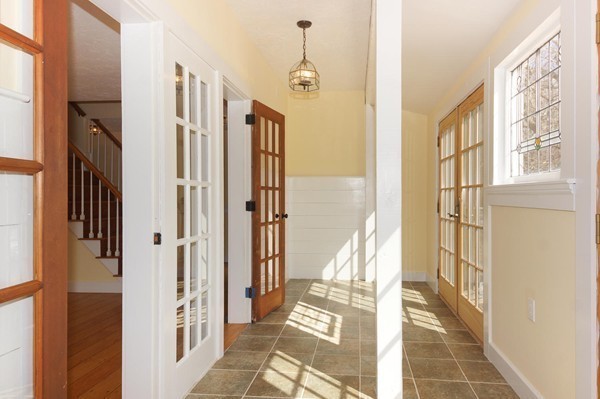 24 Prospect Hill Road Harvard, MA 01451 - Photo 8 of 28 a view of a balcony with wooden floor and staircase
