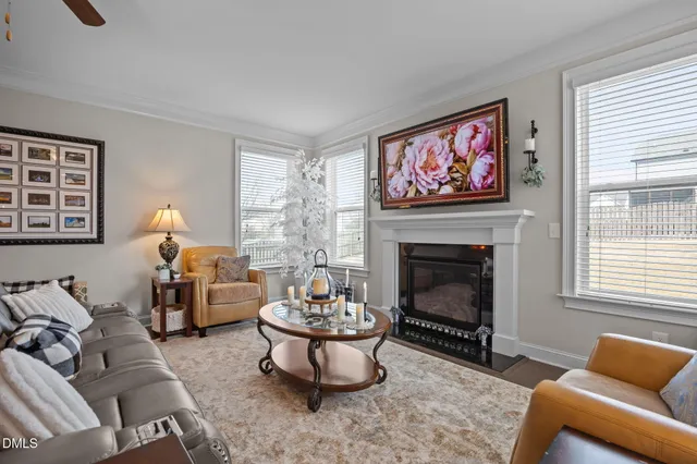 a kitchen with stainless steel appliances granite countertop a stove a sink dishwasher and cabinets with wooden floor