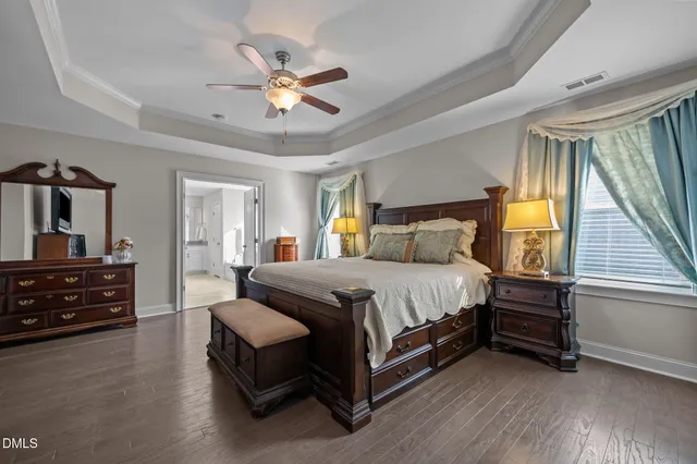 a bathroom with a sink vanity and a mirror