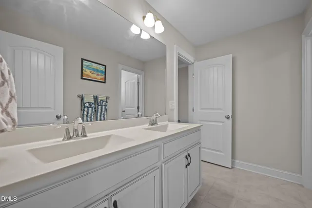 a living room with patio furniture and a window