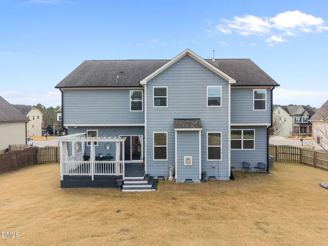 a view of a chairs and table on the deck