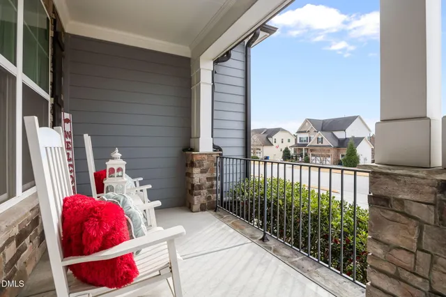 a view of a livingroom with furniture and windows