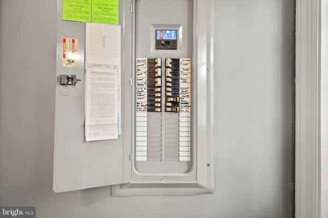 a view of room with window and wooden floor