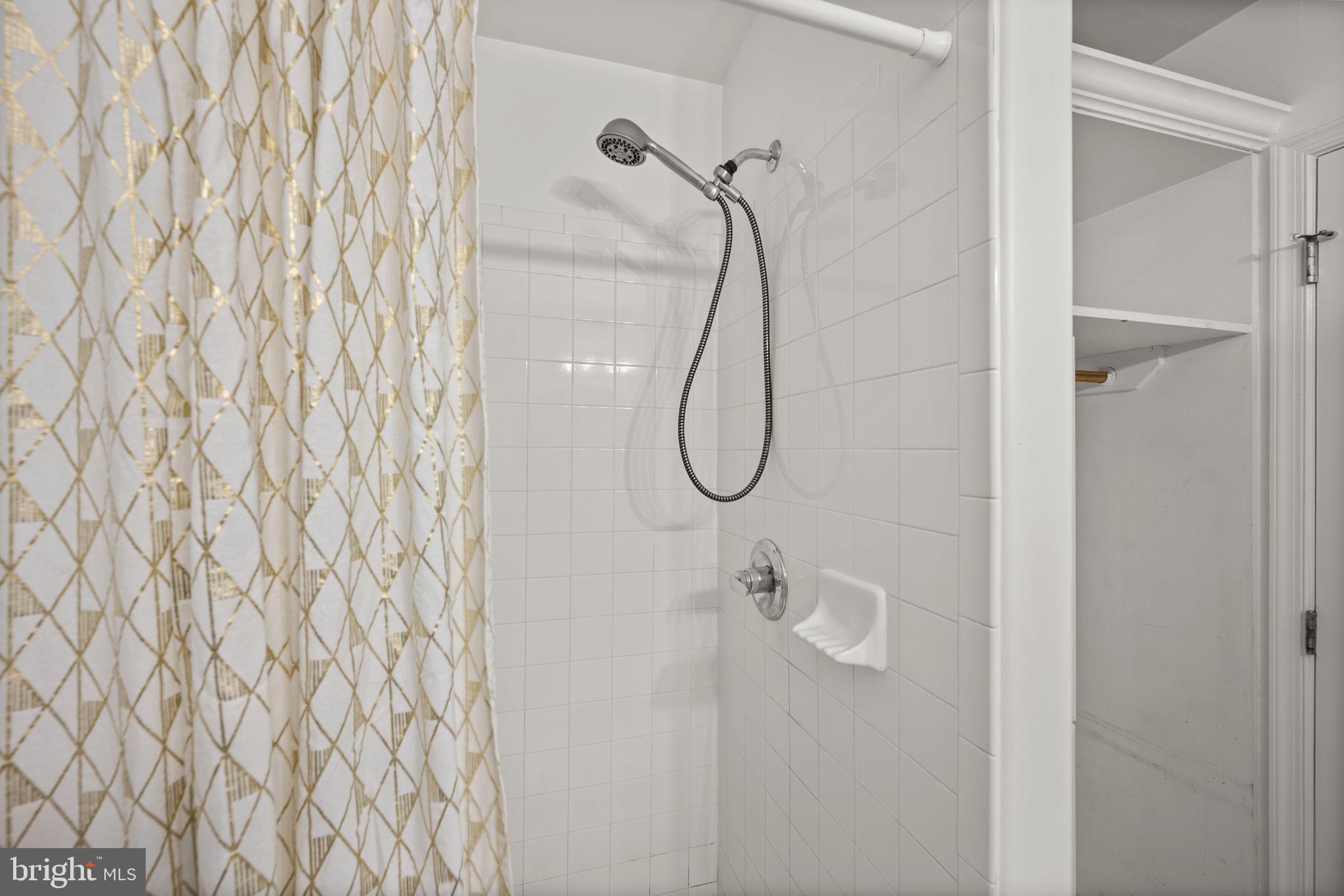 413 Griffin Court Baltimore, MD 21231 - Photo 32 of 37 a bathroom with a shower