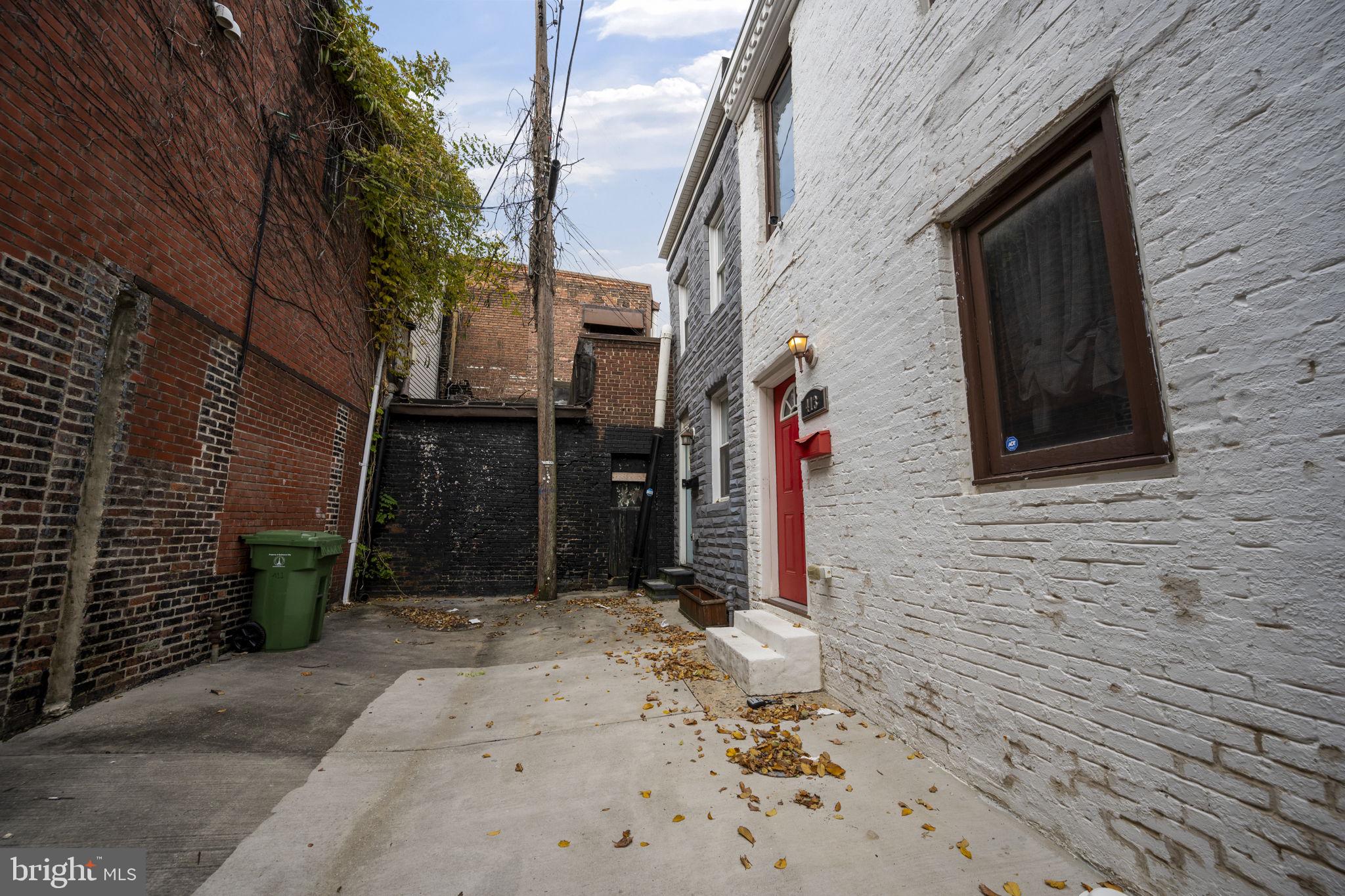 413 Griffin Court Baltimore, MD 21231 - Photo 5 of 37 a view of a pathway along the building
