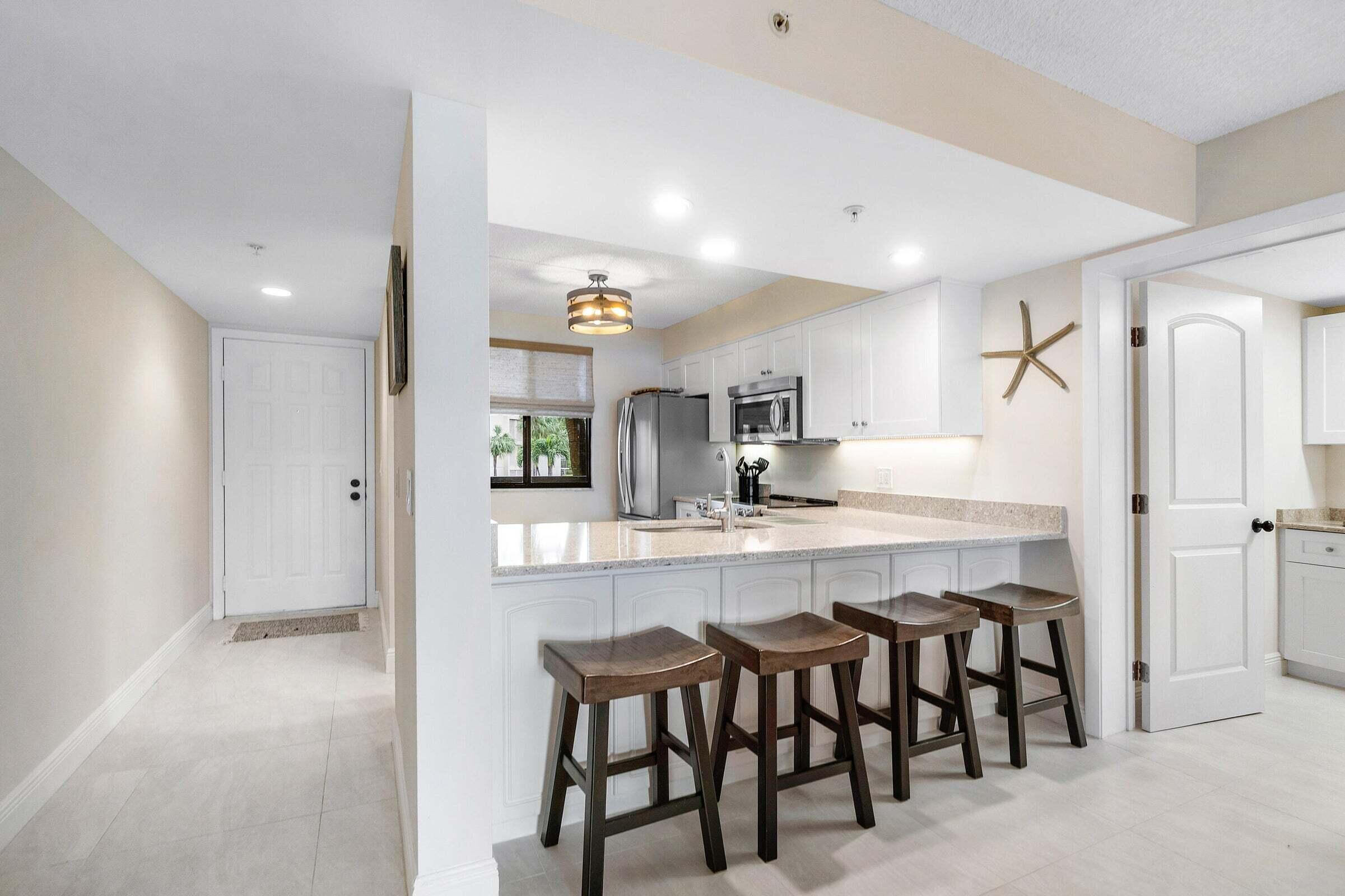 2601 Marina Isle Way, Unit 202 Jupiter, FL 33477 - Photo 2 of 53 IMG_0291