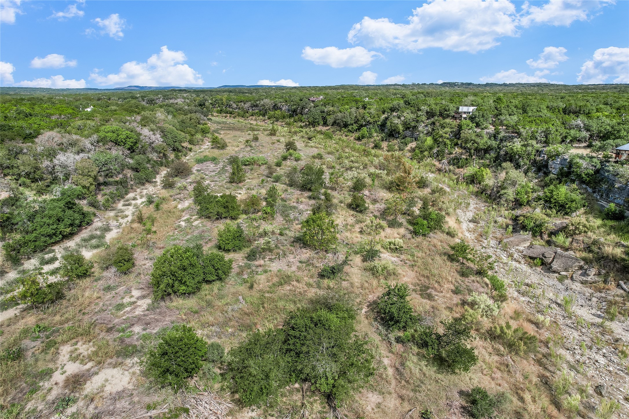401 Days End Road Wimberley, TX 78676 - Photo 15 of 16 a view of a green field