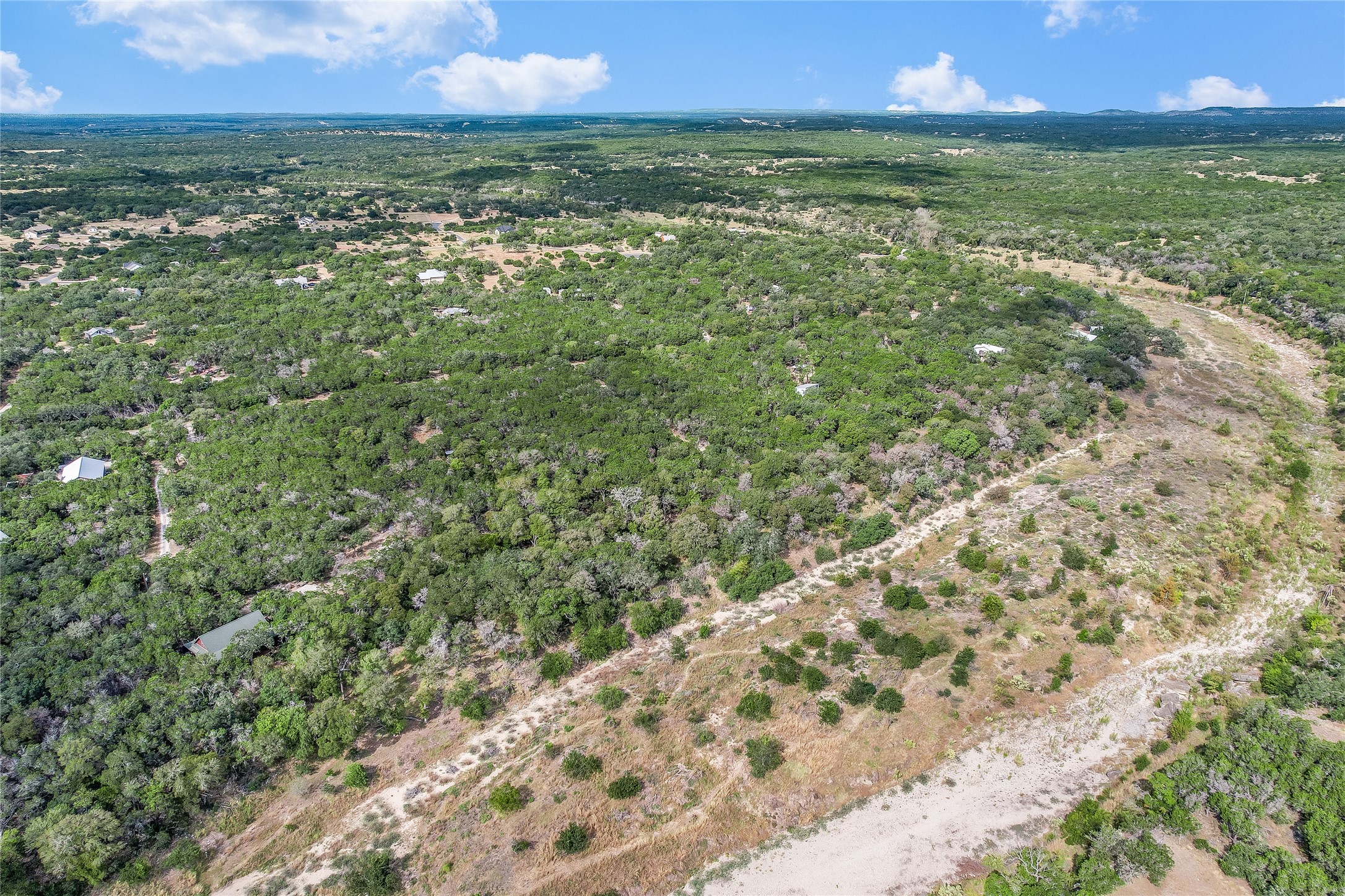 401 Days End Road Wimberley, TX 78676 - Photo 5 of 16 a view of an outdoor space and a yard