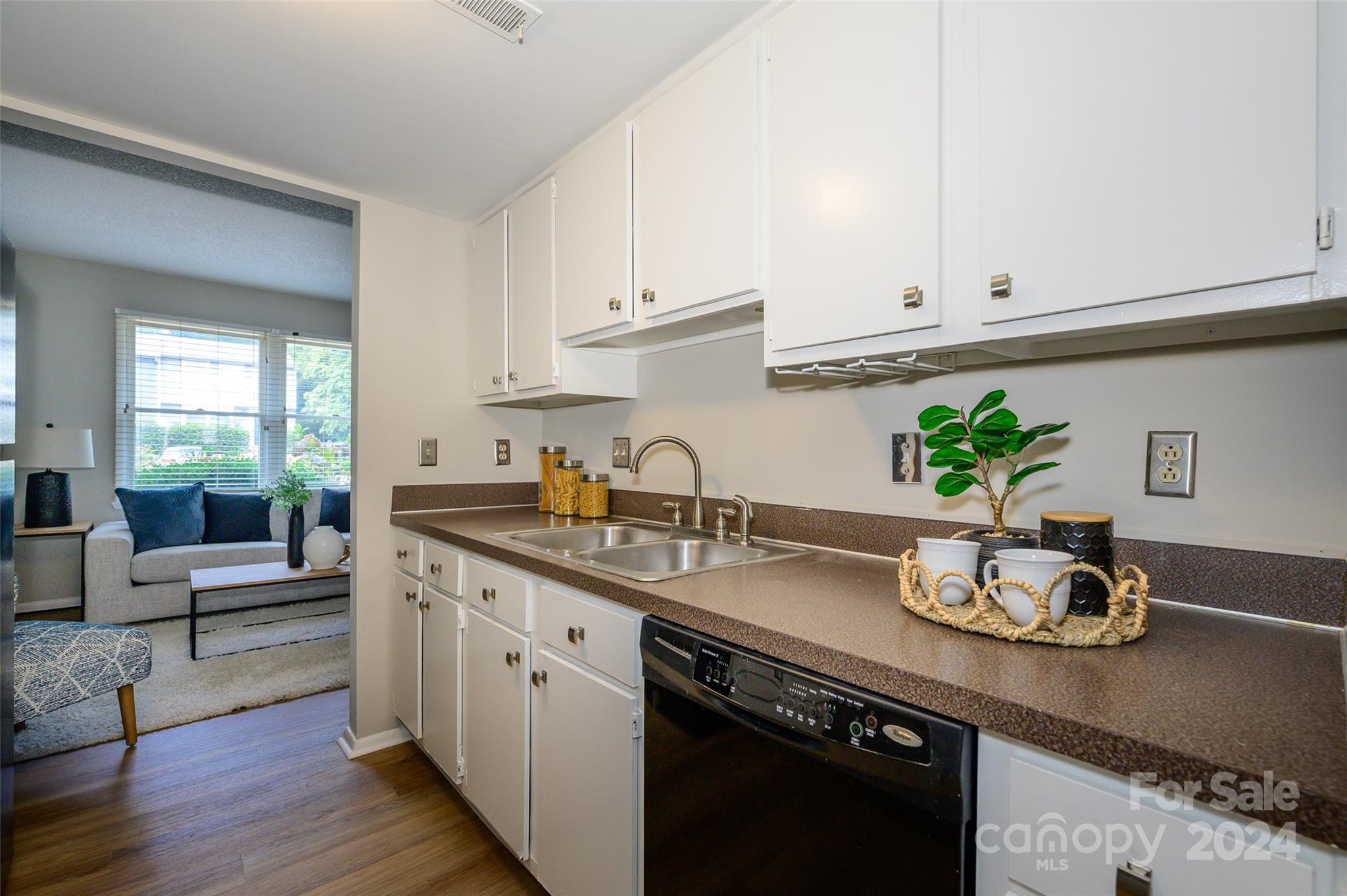 1211 Scaleybark Road, Unit B Charlotte, NC 28209 - Photo 11 of 30 a kitchen with sink stove and cabinets