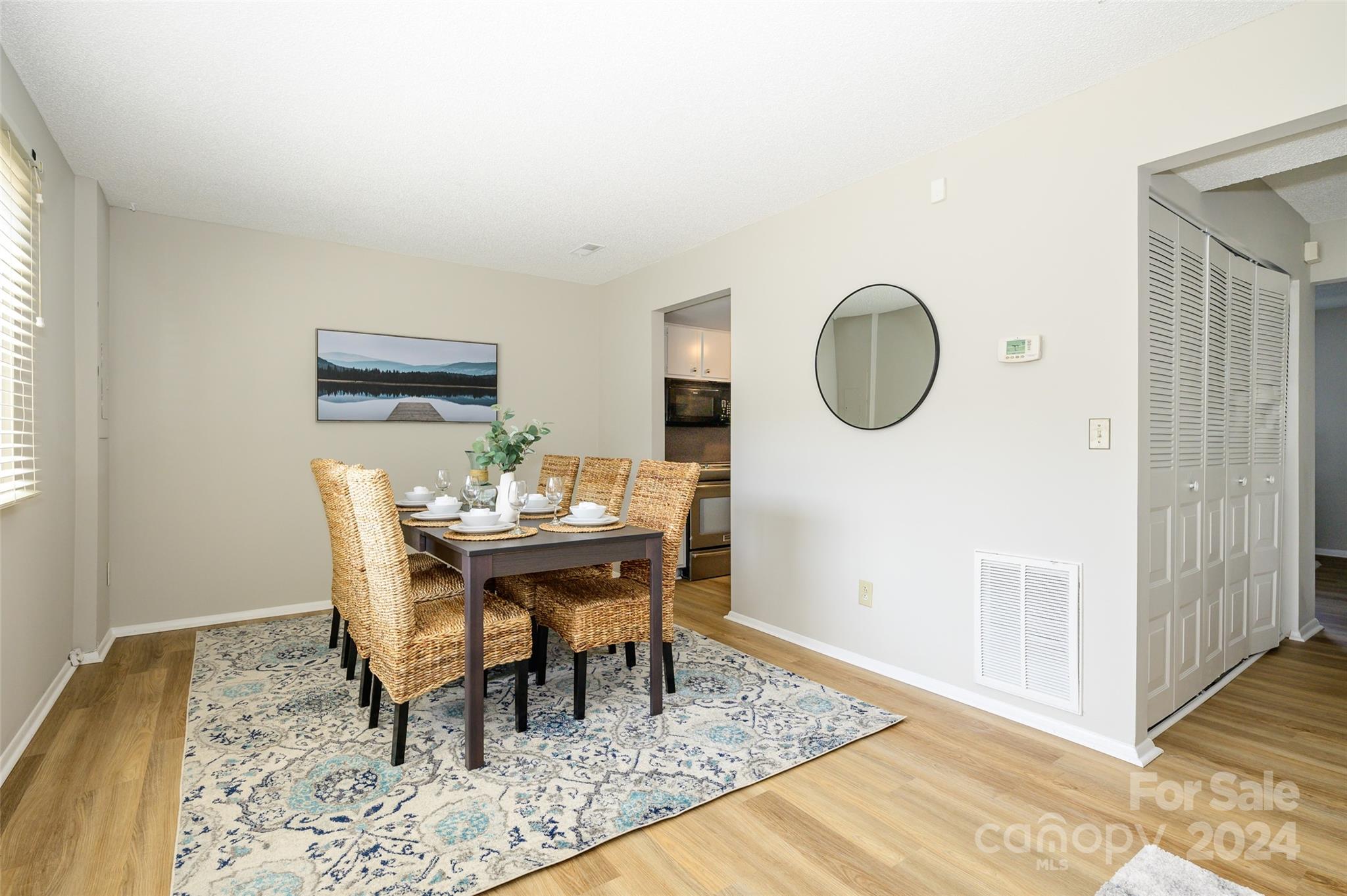 1211 Scaleybark Road, Unit B Charlotte, NC 28209 - Photo 14 of 30 a view of a dining room with furniture
