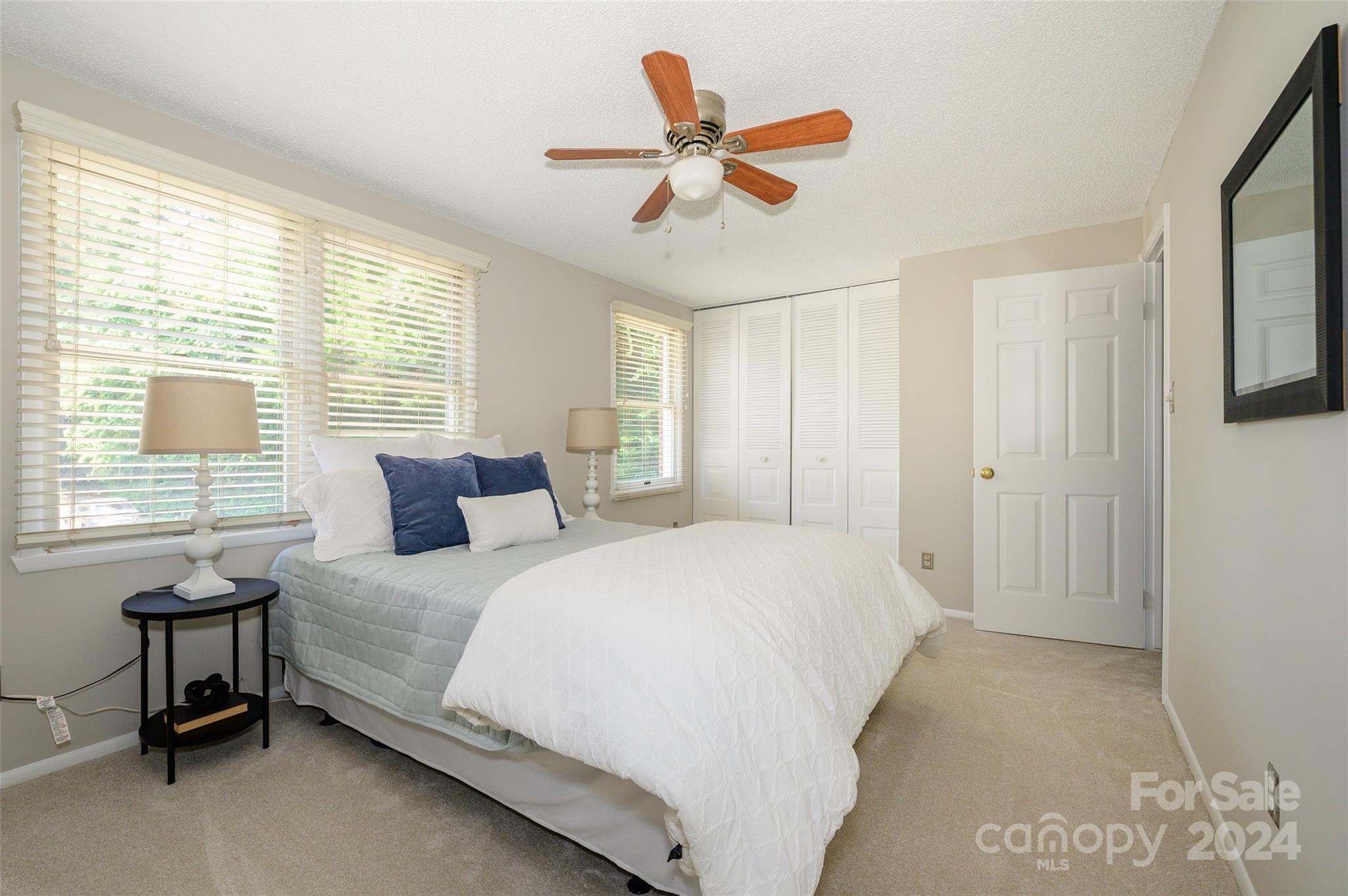 1211 Scaleybark Road, Unit B Charlotte, NC 28209 - Photo 24 of 30 a bedroom with a bed and window
