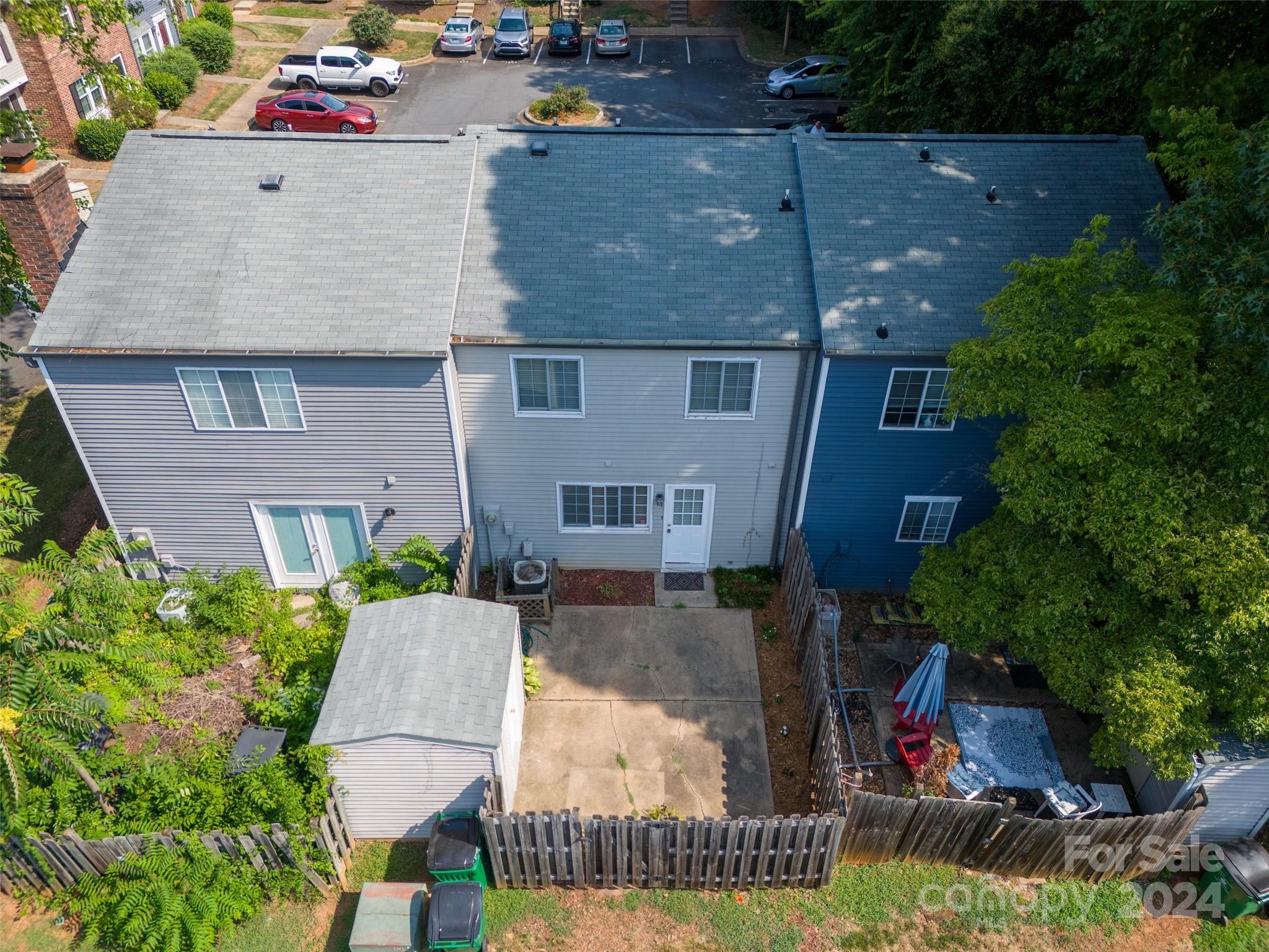 1211 Scaleybark Road, Unit B Charlotte, NC 28209 - Photo 29 of 30 an aerial view of a house with swimming pool and garden space