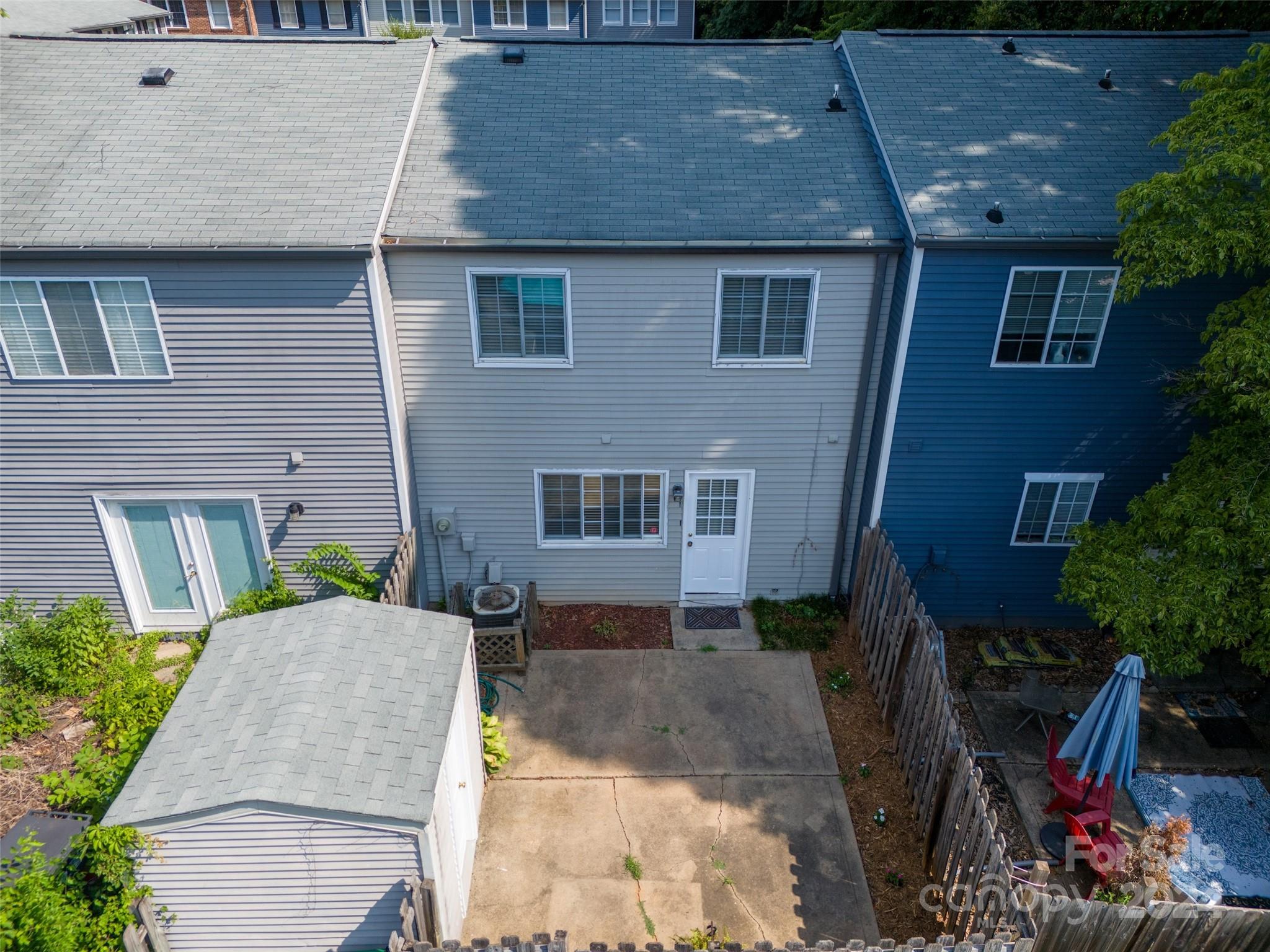 1211 Scaleybark Road, Unit B Charlotte, NC 28209 - Photo 30 of 30 a brick house with a large windows