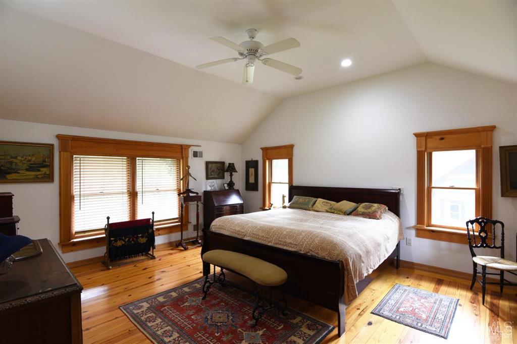 279 Cottrell Road Old Bridge, NJ 07747 - Photo 36 of 41 a bedroom with a bed and wooden floor