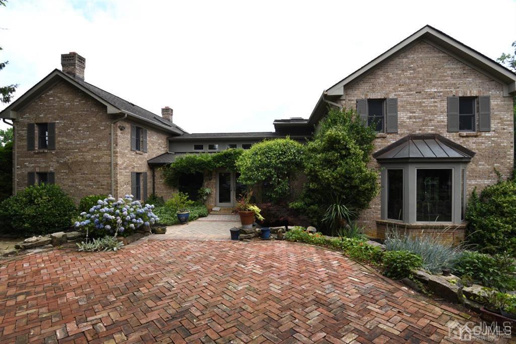 279 Cottrell Road Old Bridge, NJ 07747 - Photo 9 of 41 a front view of a house with a yard