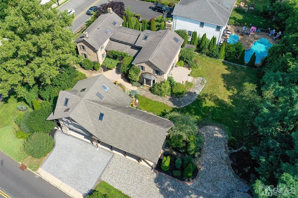 279 Cottrell Road Old Bridge, NJ 07747 - Photo 10 of 41 an aerial view of multiple houses with yard