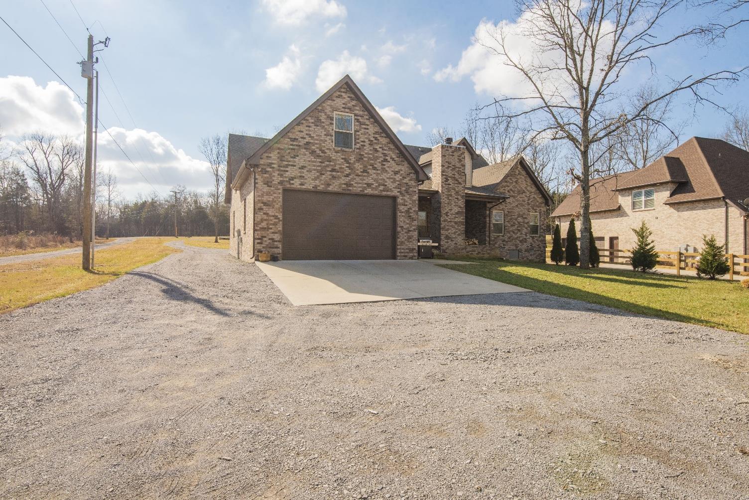 14780 Mt Pleasant Road Rockvale, TN 37153 - Photo 2 of 25 Back of house with the pull through 3 car garage